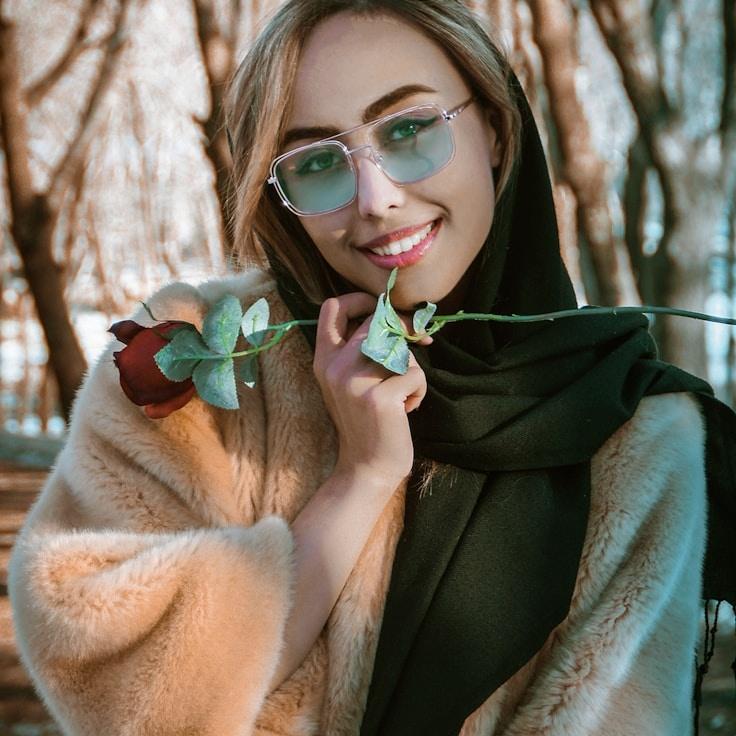 Kaveri Mehta, Lead Design Curator at SilentGardenCommunity, reviewing corporate floral arrangements